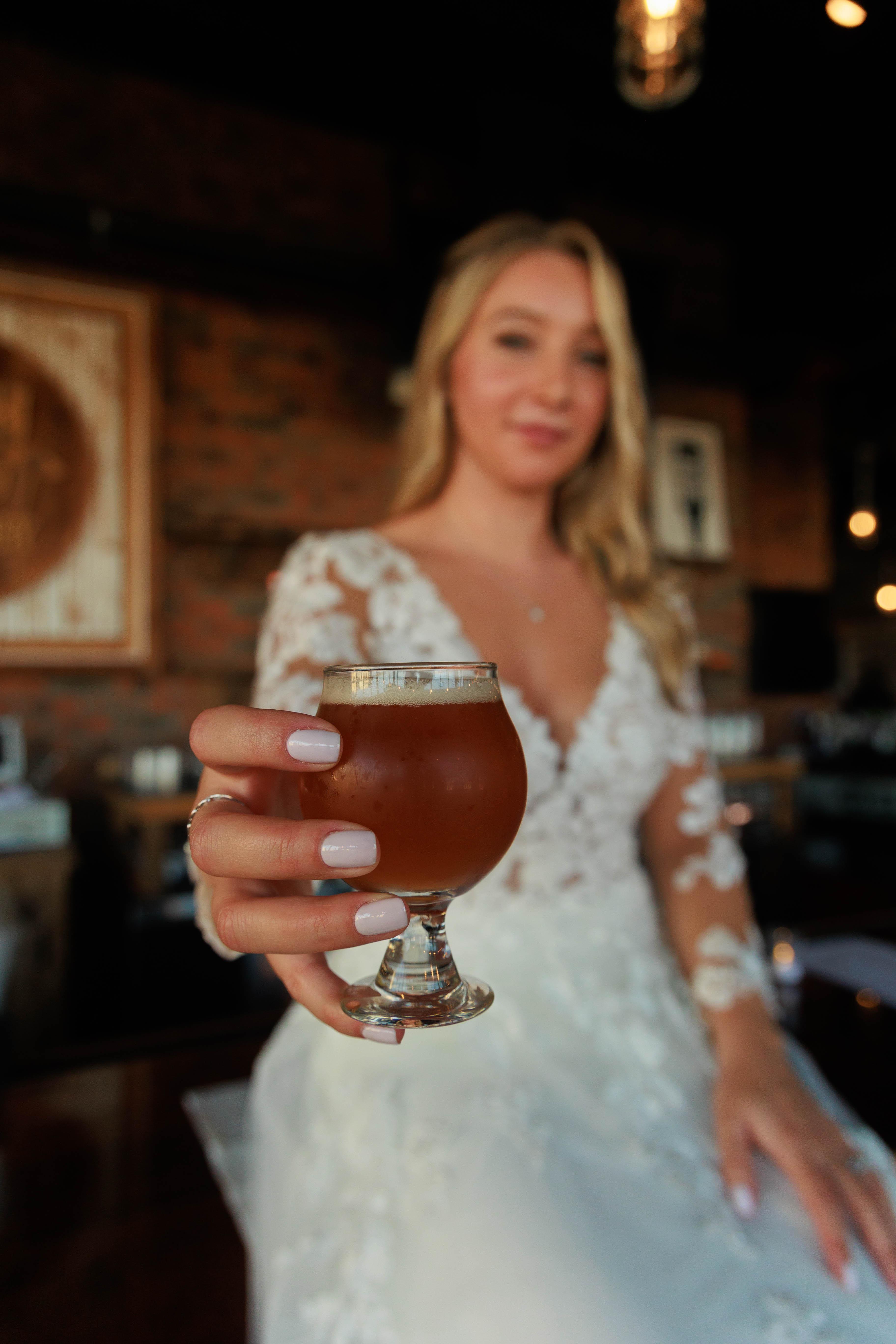 Bride at the taproom bar at Beach Haus Brewery