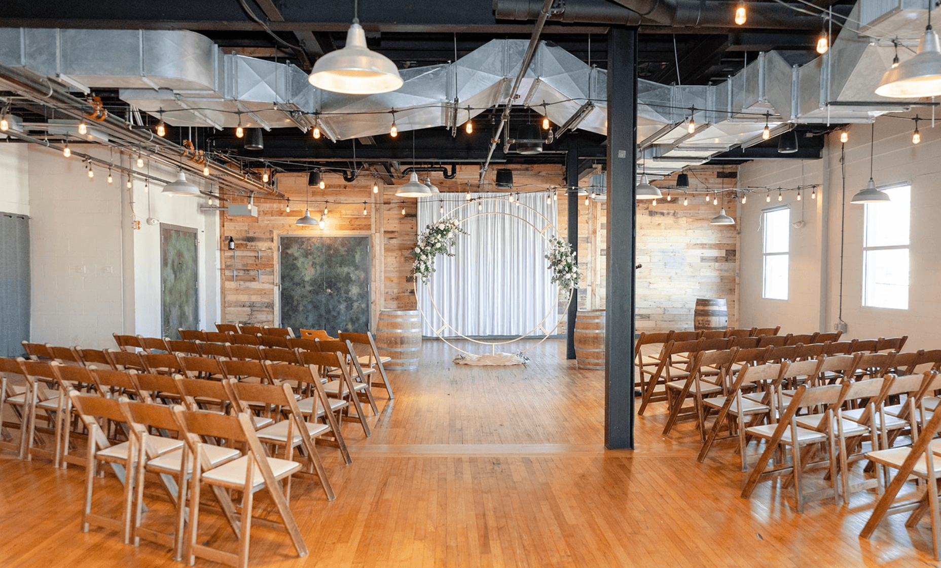 Wedding ceremony arch in the Beer Hall event space